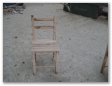 
		Cadira en llenya d'ullastre / Silla de madera de acebuche
	