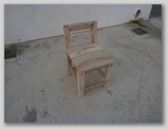 
		Cadira d'ullastre amb respatller baix / Silla de acebuche con respaldo bajo
	